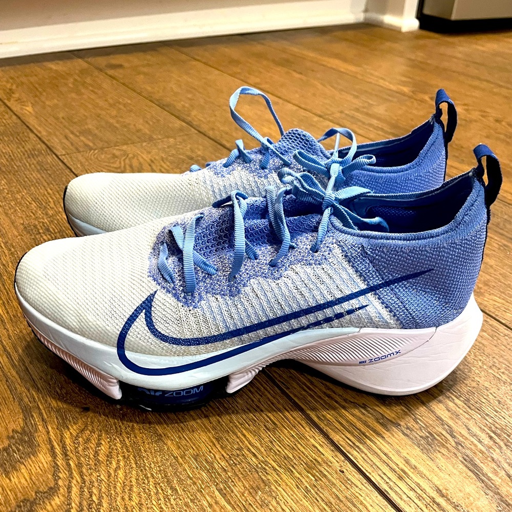 Women’s size 10 Nike Air Zoom Tempo Next %. New without tags